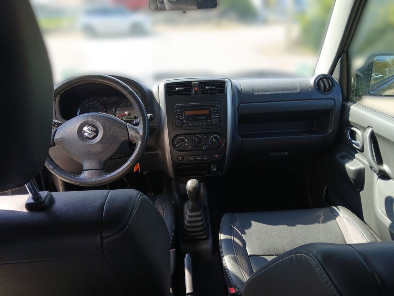 SUZUKI Jimny 1.3 4x4 Style Leder*Klima*AHK*1. Hand